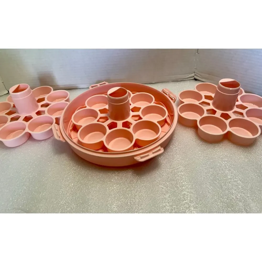 Pink Cup Cake Carrier.  Holds 12 Cup Cakes.  Can be disassembled.  Plastic